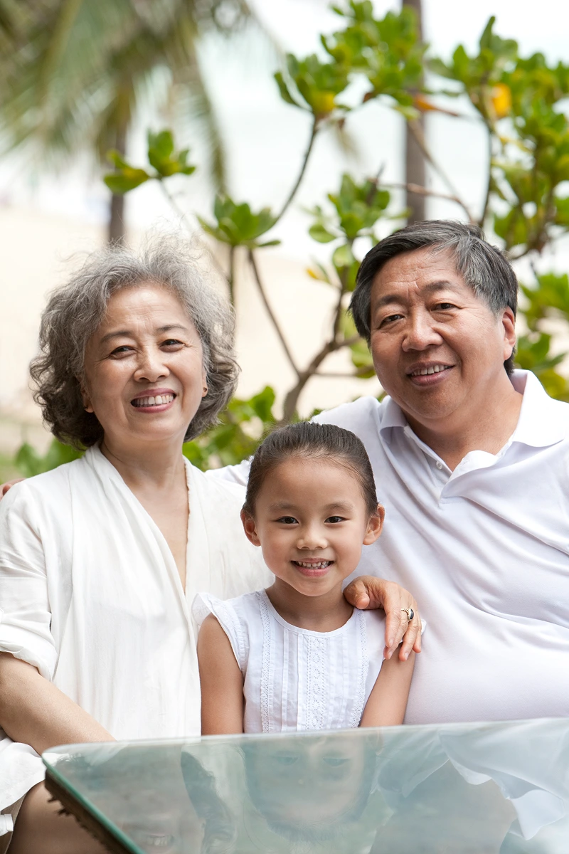 Grandparents and granddaughter together